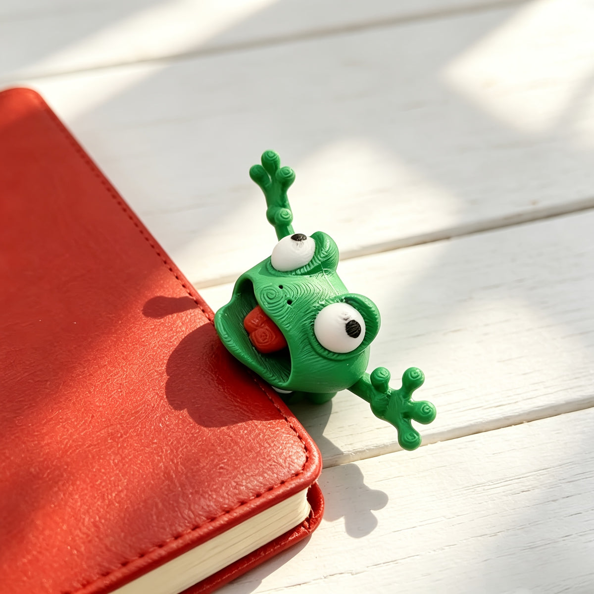 whimsical 3d stereoscopic slouchy frog bookmark reading book