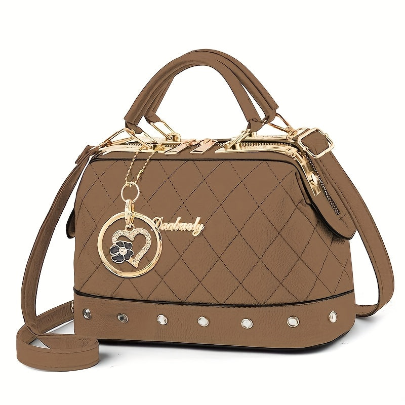 black quilted boston bag   adjustable shoulder