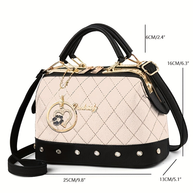 black quilted boston bag   adjustable shoulder