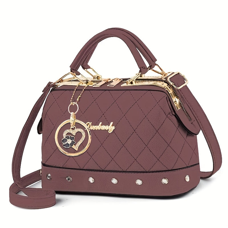black quilted boston bag   adjustable shoulder